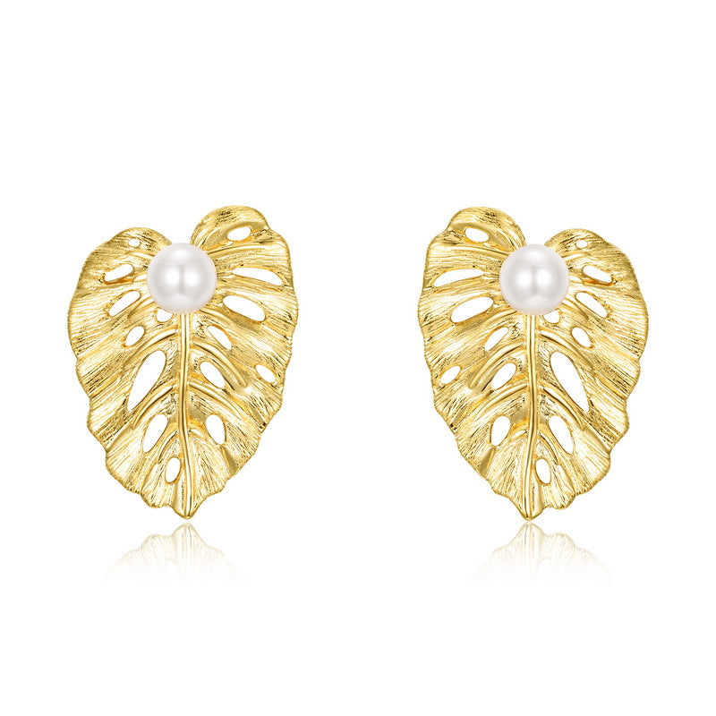 Pair of brushed leaf stud earrings with pearl details