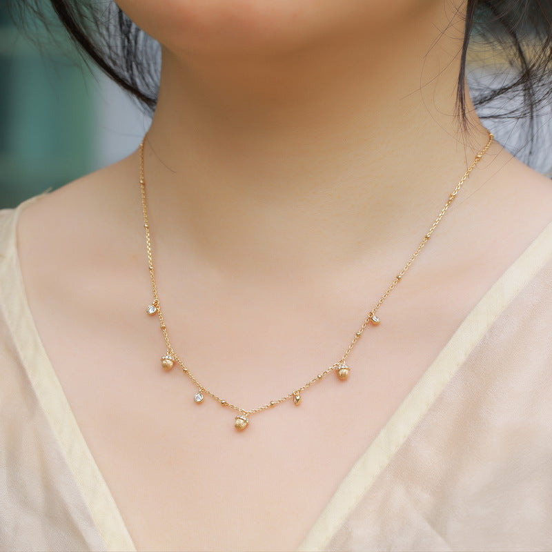 Additional view 3 of the VYLOREN Hazelnut Tassel Jewelry Collection