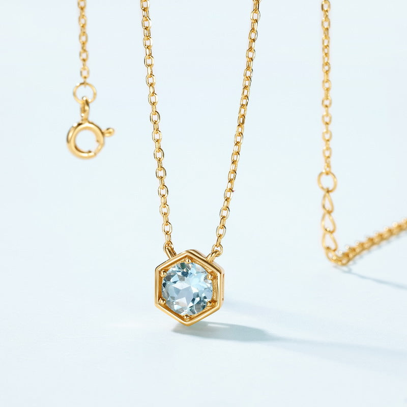 Full view of aquamarine hexagon necklace with clasp and extender