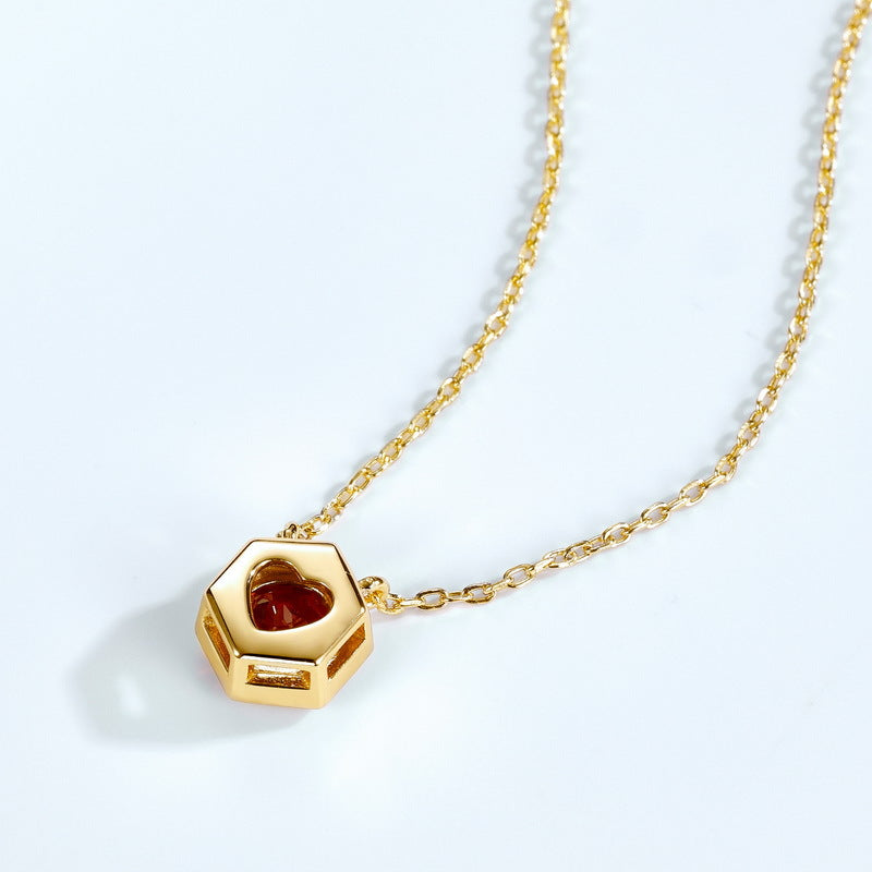 Back view of hexagon birthstone pendant and gold-plated chain