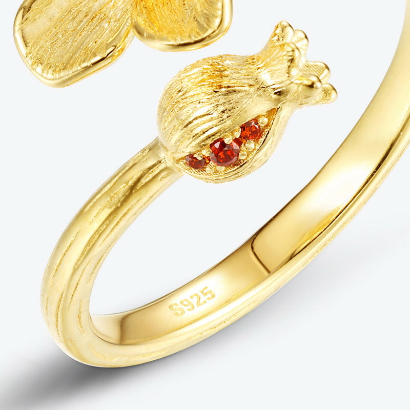 Close-up of the pomegranate detail and S925 hallmark