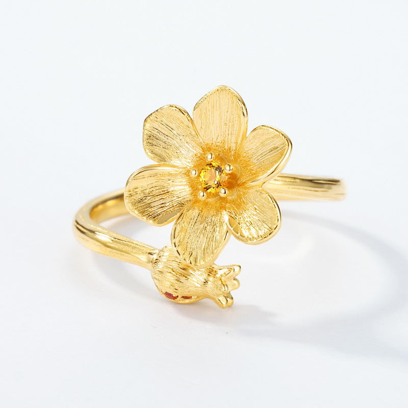 Angled view of the pomegranate flower open ring