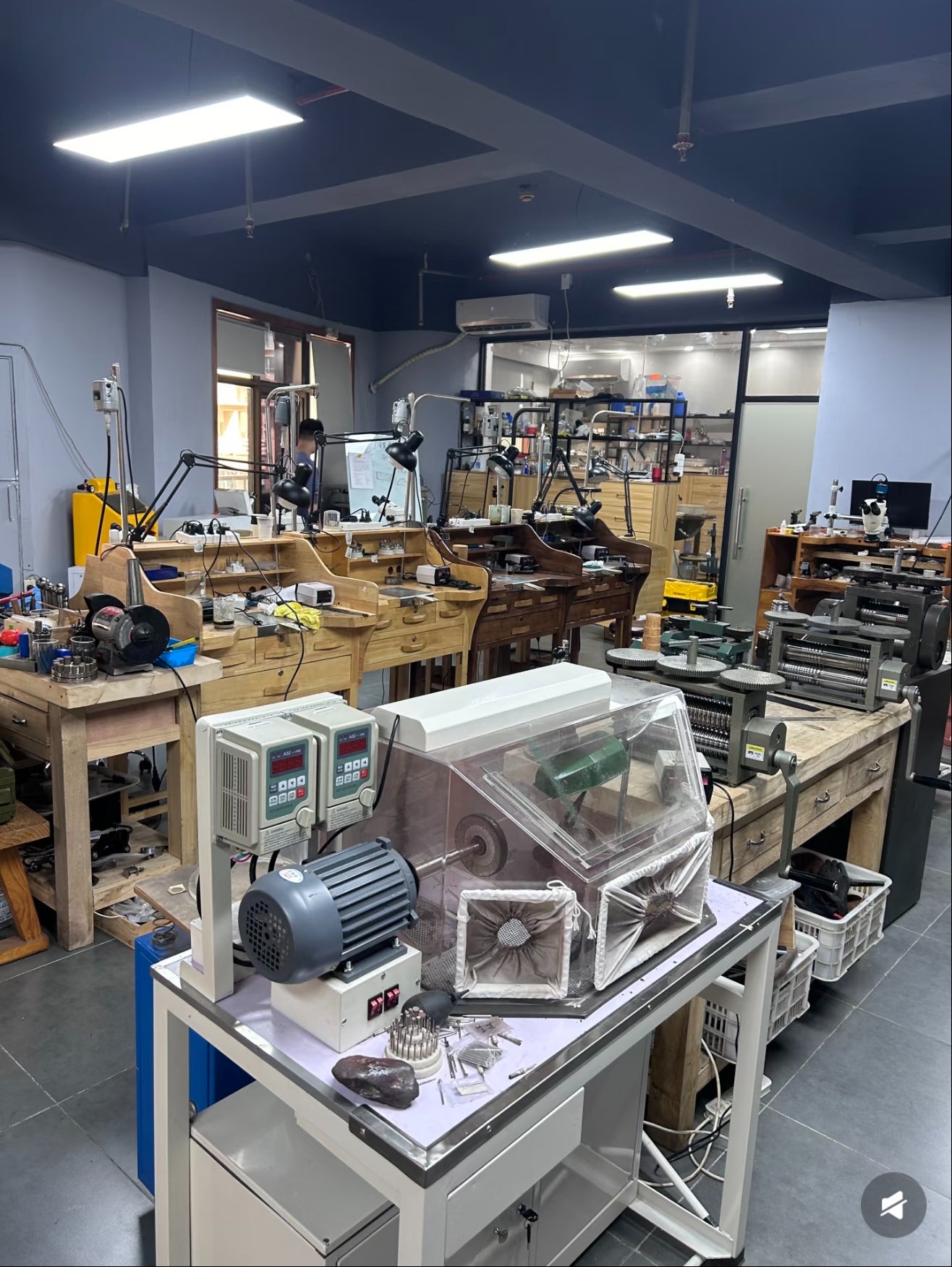 Jewelry workbenches and production equipment inside the manufacturing partner's workshop