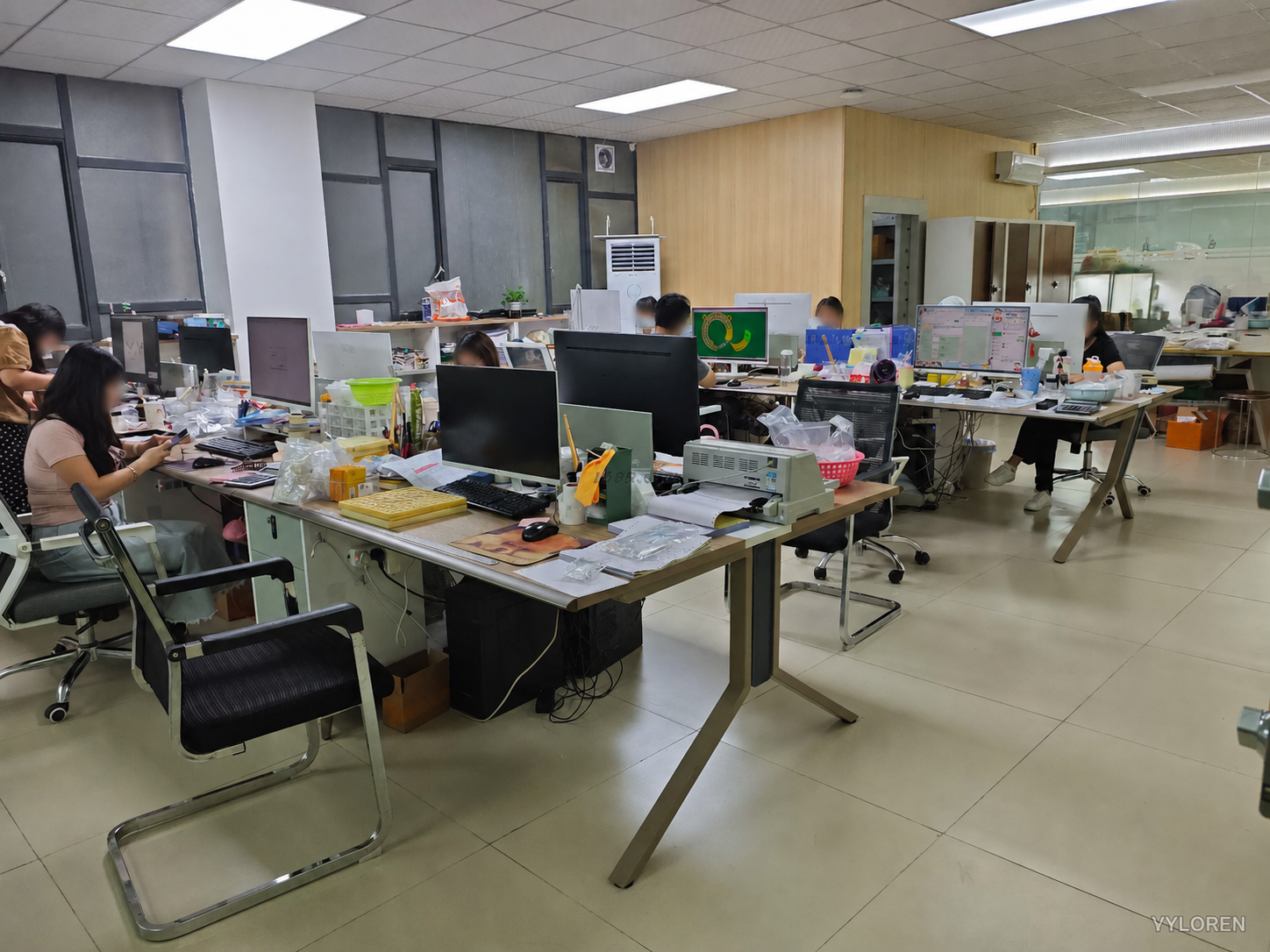 The VYLOREN design team working with jewelry drawings, samples and production details